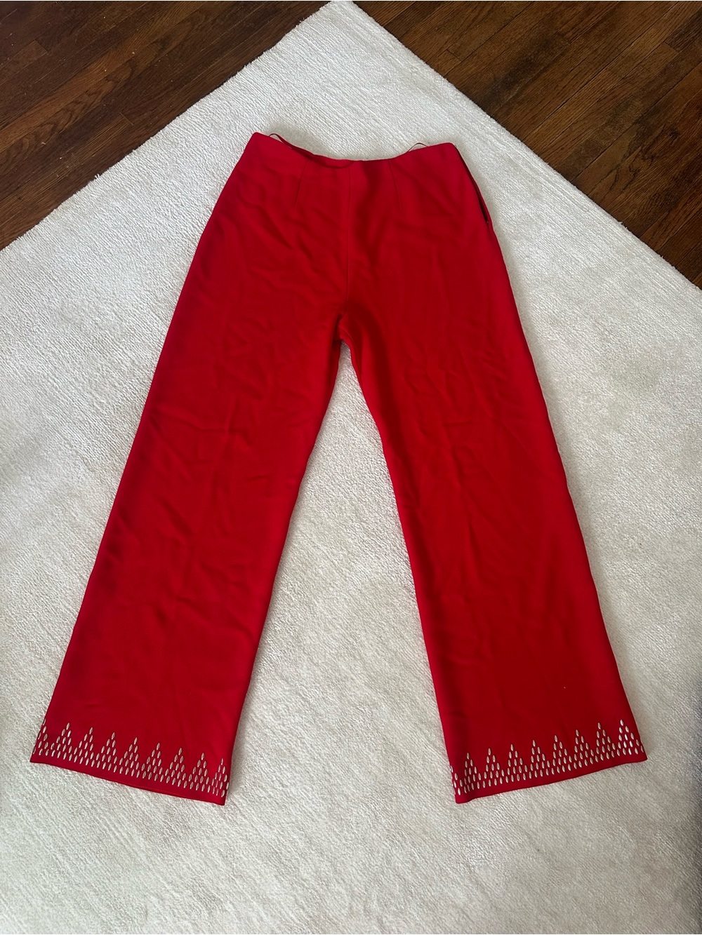 Alaïa wide leg pants with studded bottom